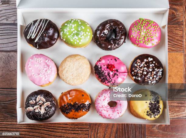 Glazed Donuts With Different Fillings Stock Photo - Download Image Now - Backgrounds, Baked, Baked Pastry Item