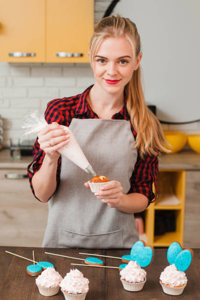 istock Chef making sweet dessert on kitchen. Cookery. 655663948