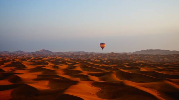 istock Hot air balloon over Dubai Desert 655664716