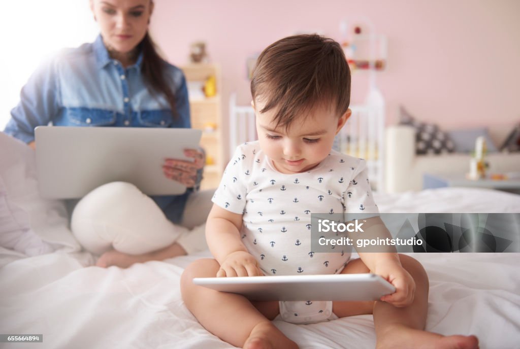 Happy baby spending time with mummy Baby - Human Age Stock Photo