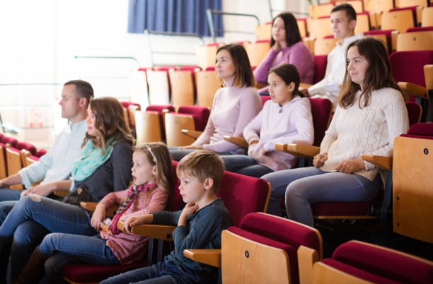 istock People enjoying film screening in cinema 655671406