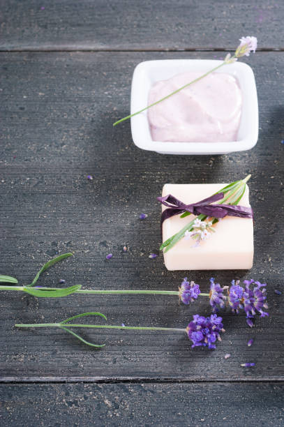 istock Beauty product samples with lavender on black 655677678
