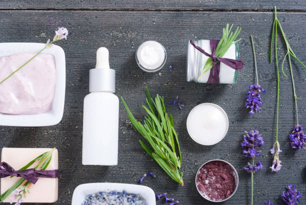 istock Beauty product samples with lavender on black 655677848