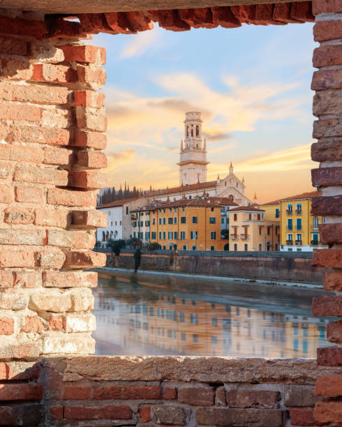 istock Old Verona town, view through brickwall window 655678482