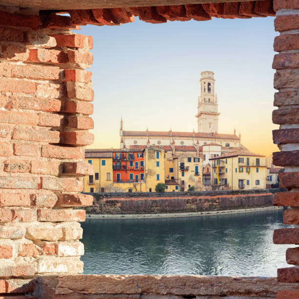 istock Old Verona town, view through brickwall window 655678540