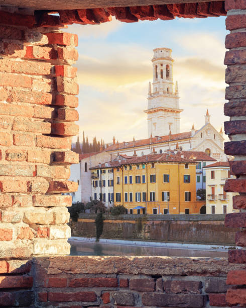 istock Old Verona town, view through brickwall window 655680764