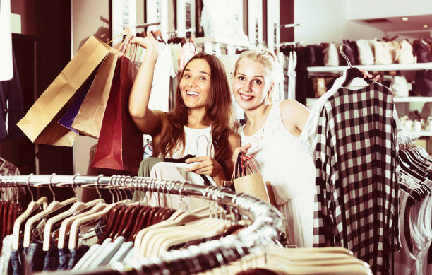 istock women shopping new clothes 655681562