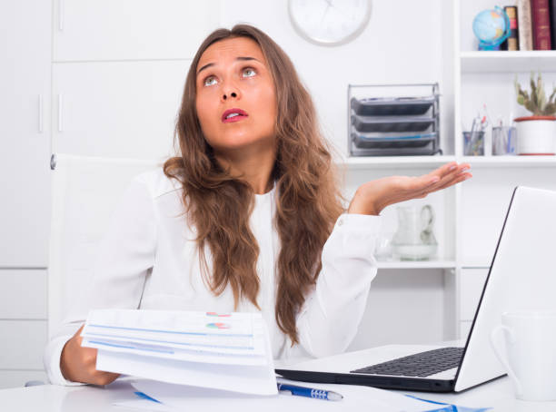 istock young woman having work troubles in office 655688550