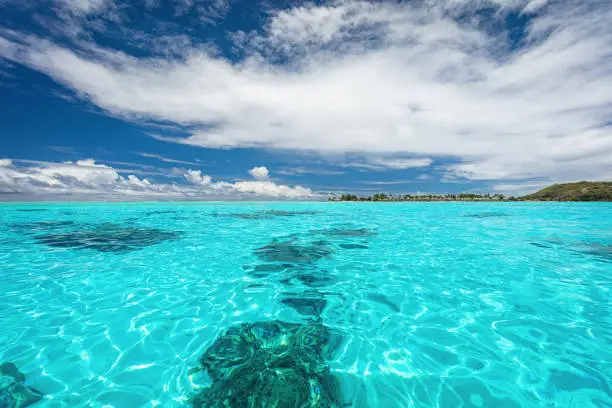 Bora Bora Island, beautiful clean turquoise water and reef surrounding the main island of Bora Bora, Society Islands, French Polynesia.