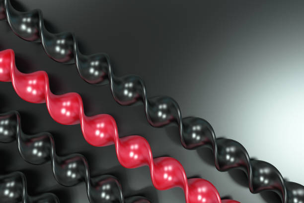 istock Black and red plastic spiral sticks on black background 655688928