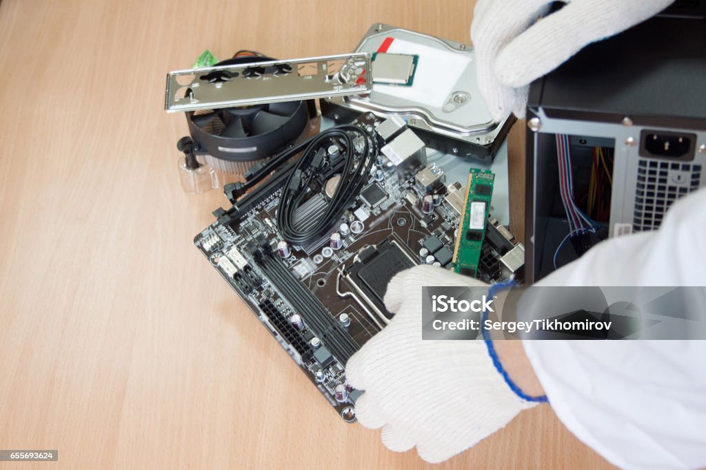 Electronics Engineer Computer Electronics Engineer Making A Modern Personal Computer Stock Photo ...