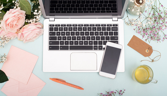 Romantic office setting laptop and smartphone mockup hero header for responsove web design