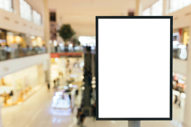 istock Blank mock up of vertical poster billboard sign with copy space for your text message or content in modern shopping mall. 655700320
