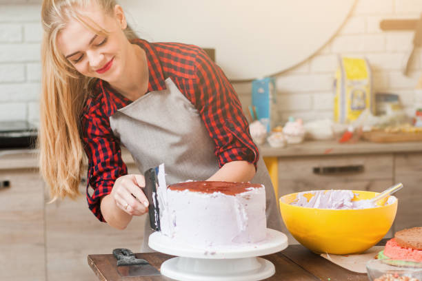 istock Girl cooking sweet dessert. Culinary class. 655704428