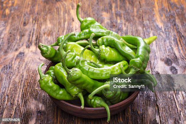 Green Chili Peppers Stock Photo - Download Image Now - Green Chili Pepper, Variation, Backgrounds