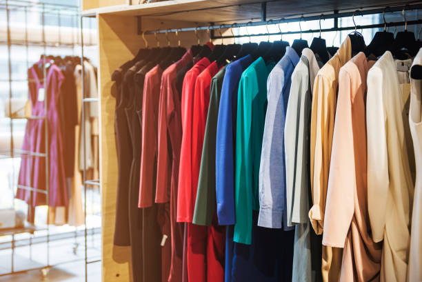 istock Women clothes on racks in a boutique store 655704916
