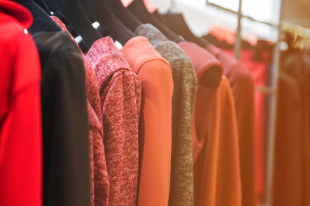 istock Women clothes on racks in a boutique store 655708644