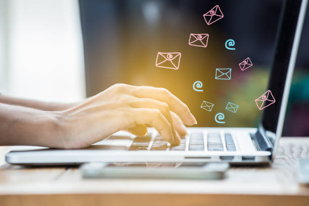 istock Cropped shot of woman's hands keyboarding while messaging friends via social networks using computer laptop. Female  checking e-mail, sitting at the wooden desk. 655708730
