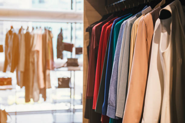 istock Women clothes on racks in a boutique store 655711188