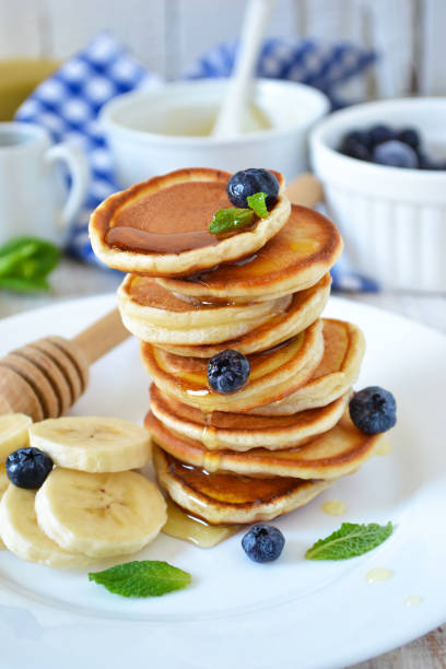 istock Pancakes for breakfast with honey and blueberries 655721502