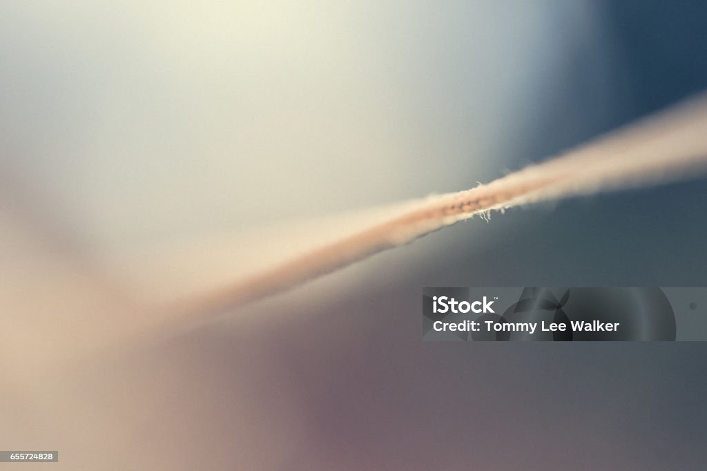 Abstract backgrounds vintage string in shallow focus Abstract blurred string in bokeh lights Hanging Stock Photo