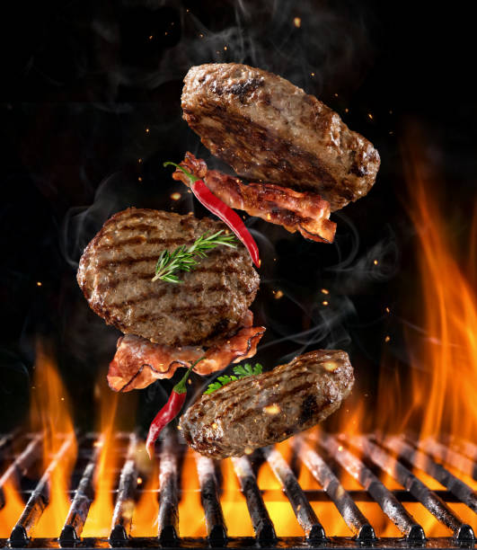 istock Beef milled meat flying above grill 655728902