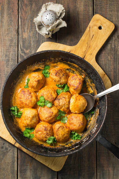istock Tasty meatballs in sauce 655734266