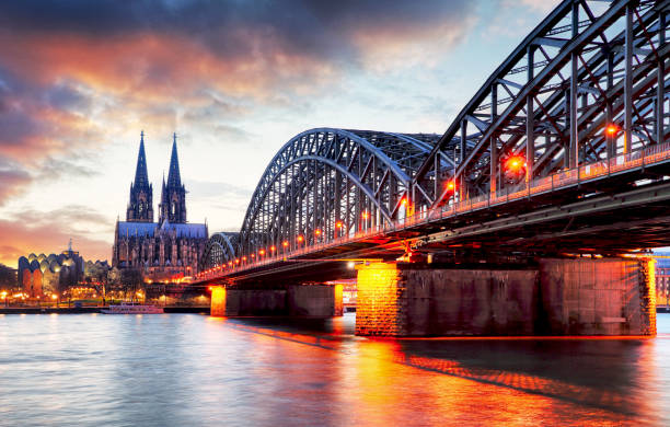 istock Cologne Cathedral and Hohenzollern Bridge at sunset - night 655737014
