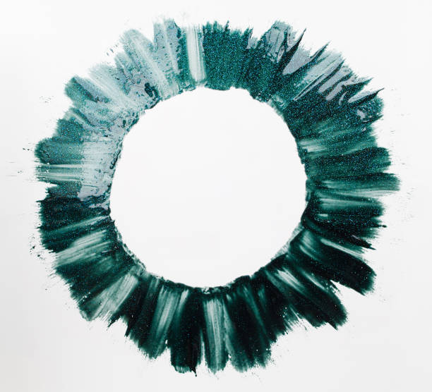 istock Round frame of green nail polish paints free space 655737030