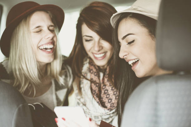 istock Three best friends riding in the car. 655745428