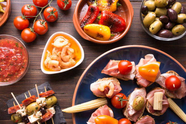 istock Spanish tapas appetizers on wooden table 655748324