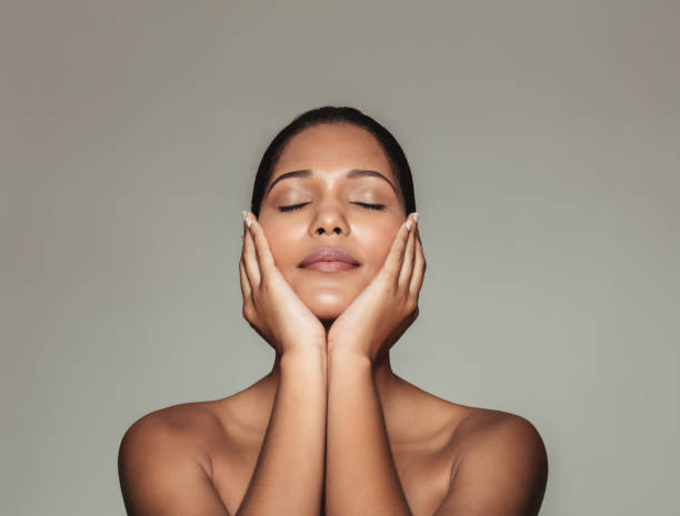 istock Beautiful woman touching her fresh clean face 655753060