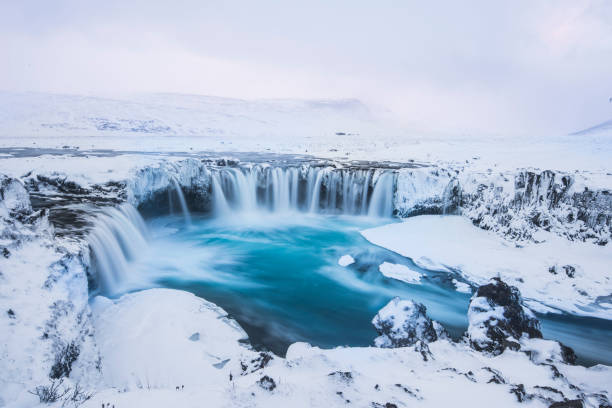 istock Godafoss waterfall in Iceland, covered in snow 655758388