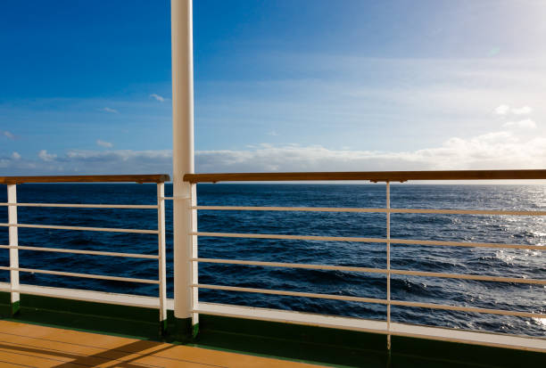 istock Ship banisters and dark blue sea behind 655767918