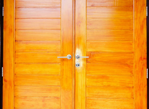 istock Close up brown modern wooden door 655772558