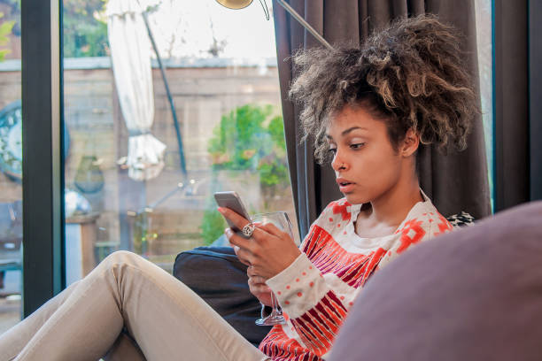 istock woman with worried expression on the phone. stressed shocked 655776776
