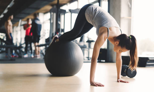 istock Athletic woman during aerobics training in gym 655786332