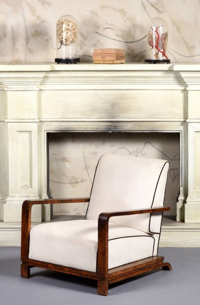 istock Art Deco style upholstered white armchair 655786490
