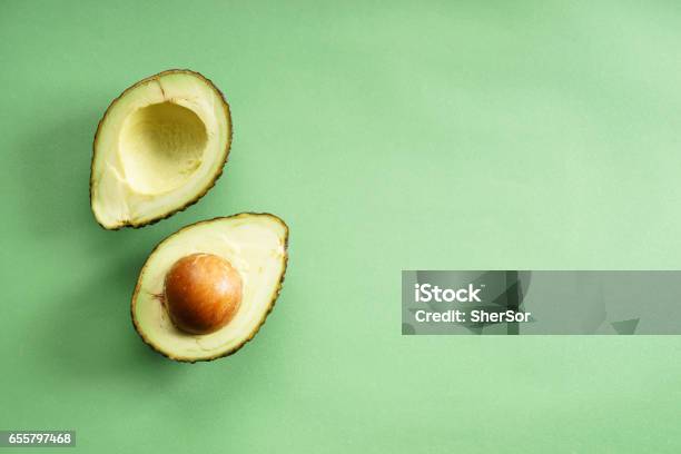 Avocado Stock Photo - Download Image Now - Avocado, Colored Background, Fruit