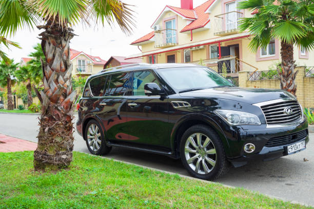 New luxury japanese auto Infiniti QX56 parked on the street of Sochi City. New luxury japanese auto Infiniti QX56 parked on the street of Sochi City. armada stock pictures, royalty-free photos & images