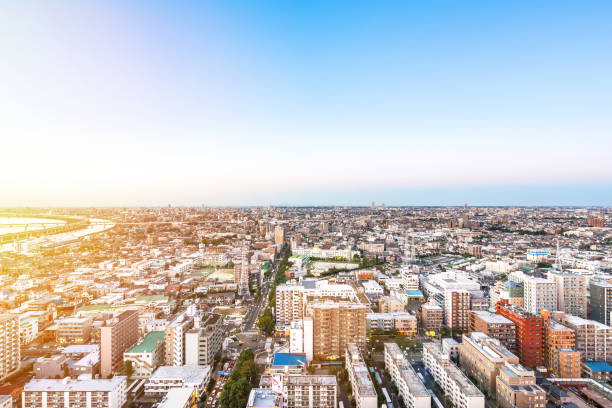 istock panoramic modern city skyline bird eye aerial view under dramatic sunset glow and beautiful cloudy sky in Tokyo, Japan 655801200