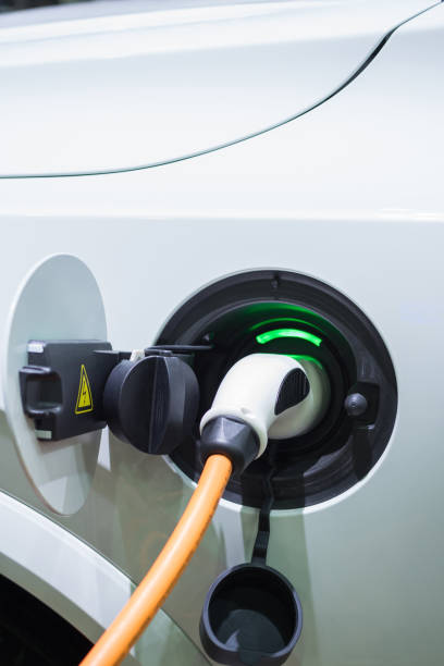 istock Charging an electric car with the power cable supply 655801838