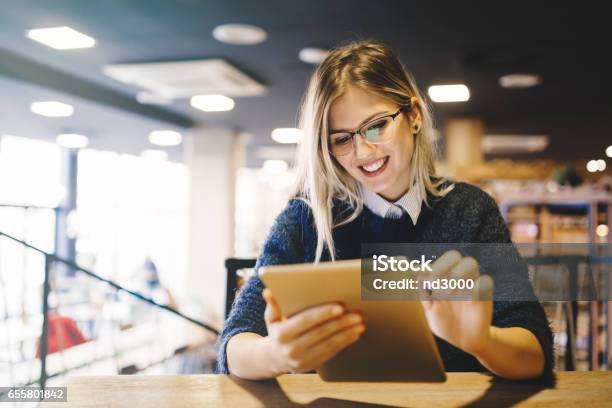 Student Studying On Tablet Pc Stock Photo - Download Image Now - Digital Tablet, Reading, Student