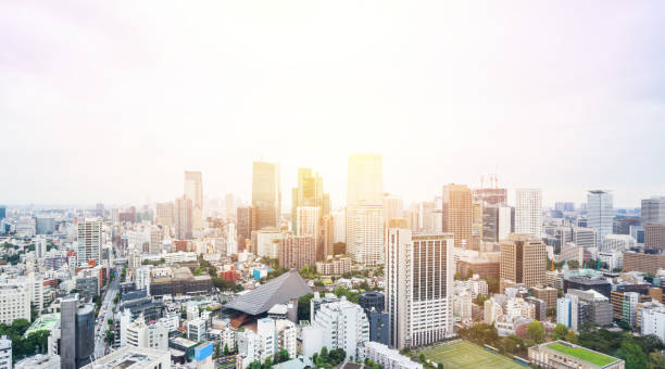 istock panoramic modern city skyline bird eye aerial view with mode gakuen cocoon tower under dramatic sun and morning blue cloudy sky in Tokyo, Japan 655802068