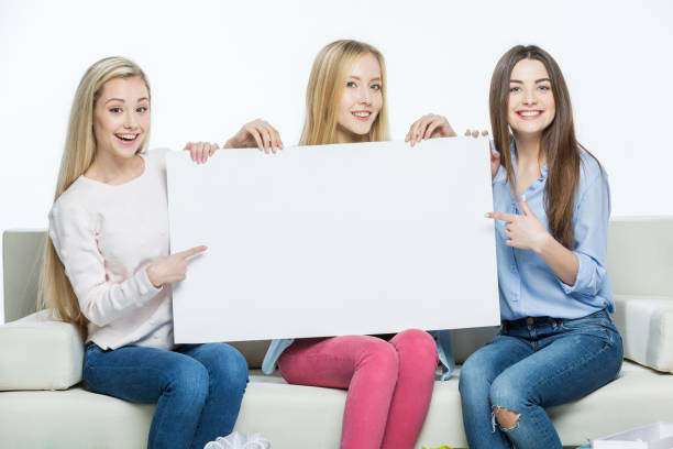 istock Women holding blank card 655807034