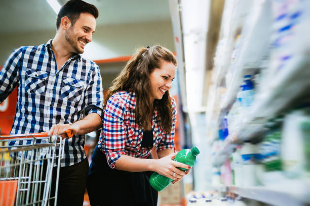 istock Couple shopping for ingridients  in grocery store together 655807270