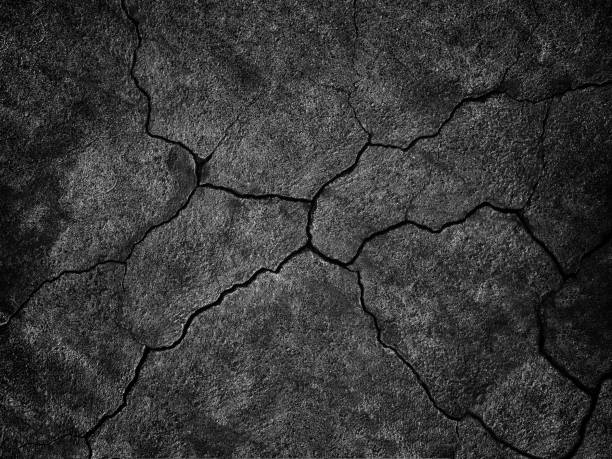black wall with cracks texture for background