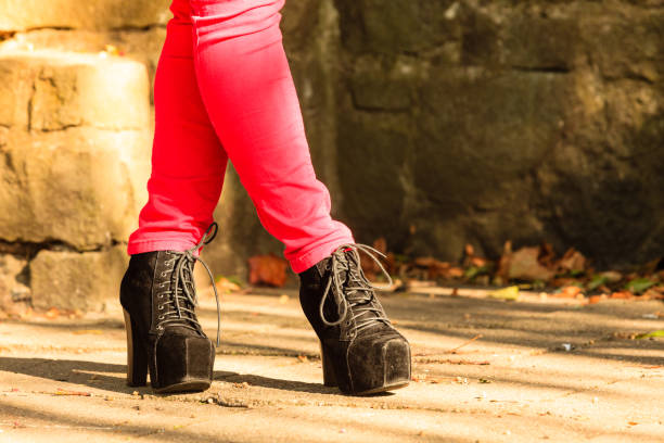 istock Female foot in elegant black shoes. 655809990