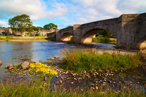 Burnsall Bridge In The Yorkshire Dales Burnsall Bridge In The Yorkshire Dales river wharfe stock pictures, royalty-free photos & images