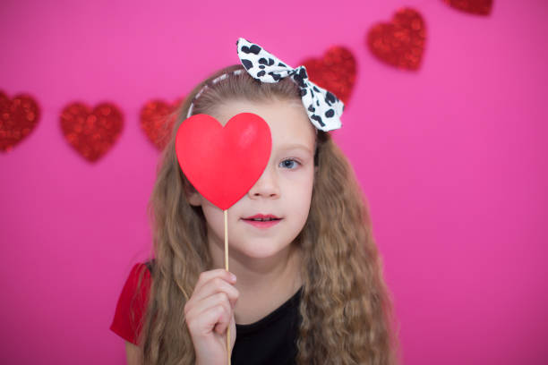 istock Kids celebrating St Valentine's Day 655818374